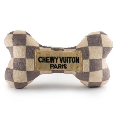 A plush dog bone with a brown checkered print.