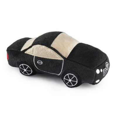 A plush dog toy in the shape of a luxury car